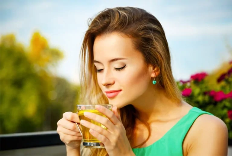woman enjoying green tea